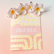 Load image into Gallery viewer, Yellow plumeria lei greeting card next to four plumeria floweres