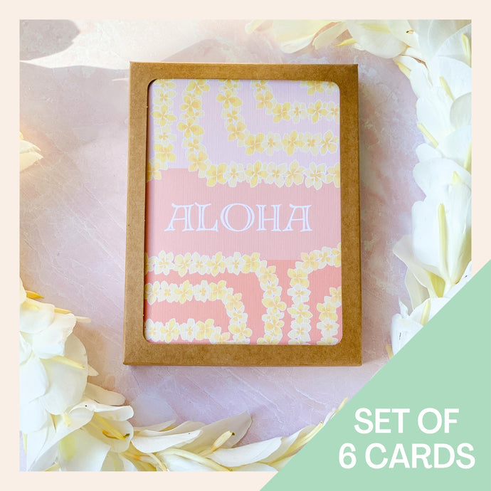 Card set against a pink background and mint label that says Set of six cards