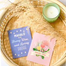 Load image into Gallery viewer, cornflower blue card and pink card on a beige basket weave background with a green candle